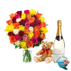 Bouquet di rose colorate con peluche e vino bianco