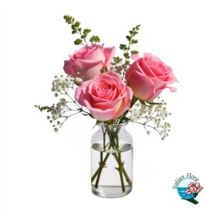 Tre rose rosa in vaso