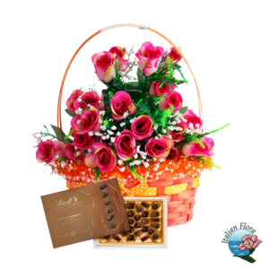Cesto di rose rosa con scatola di cioccolatini