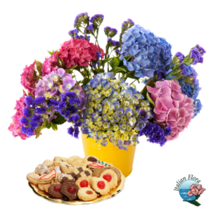 Bouquet di fiori rosa e viola con pasticcini